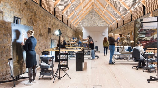 Conservators working on collection items at The Royal Oak Foundation Conservation Studio at Knole, Kent